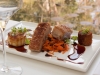 Crispy Skinned Pork Belly with Pork Croquette, Pickled Carrot, Currents and Smoked Fondant Potato