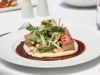 Crispy Skinned Pork Belly with Parmesan Mash, Apple & Hazel Nut Salad, Jus